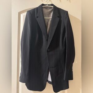 Classic Black Wonen’s Blazer with subtle vertical pinstripes